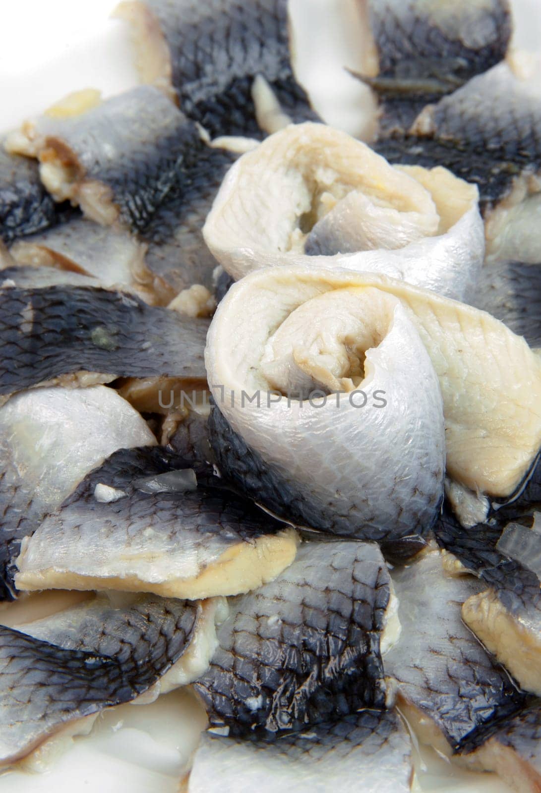 marinanated fish pieces on plate