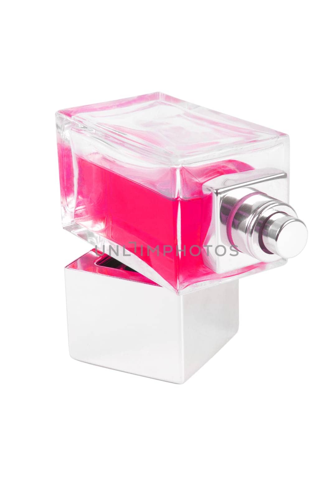 pink perfume bottle over white surface