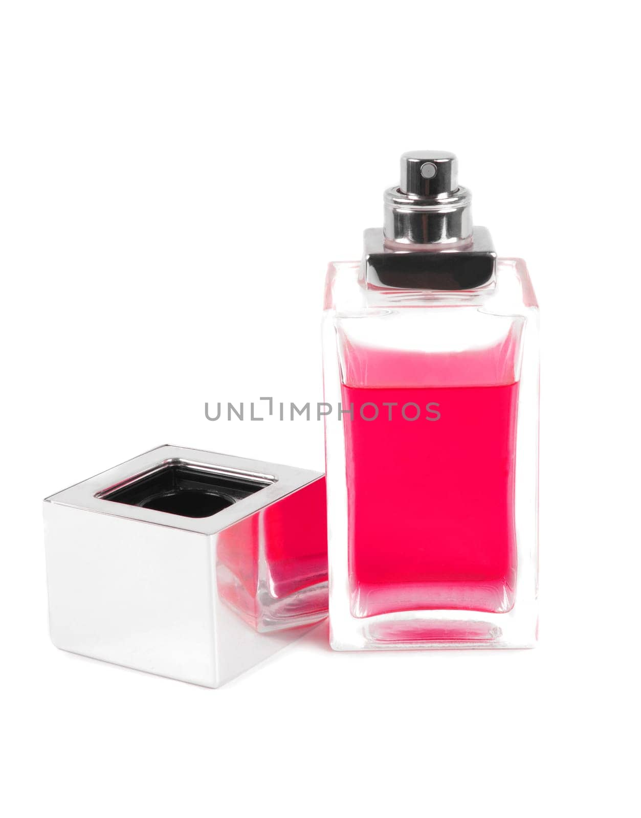 pink perfume bottle over white surface