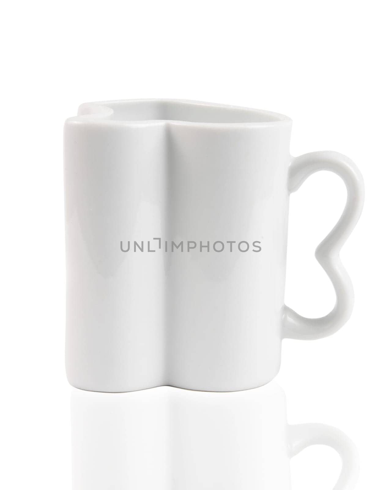 big mug in the shape of heart over white
