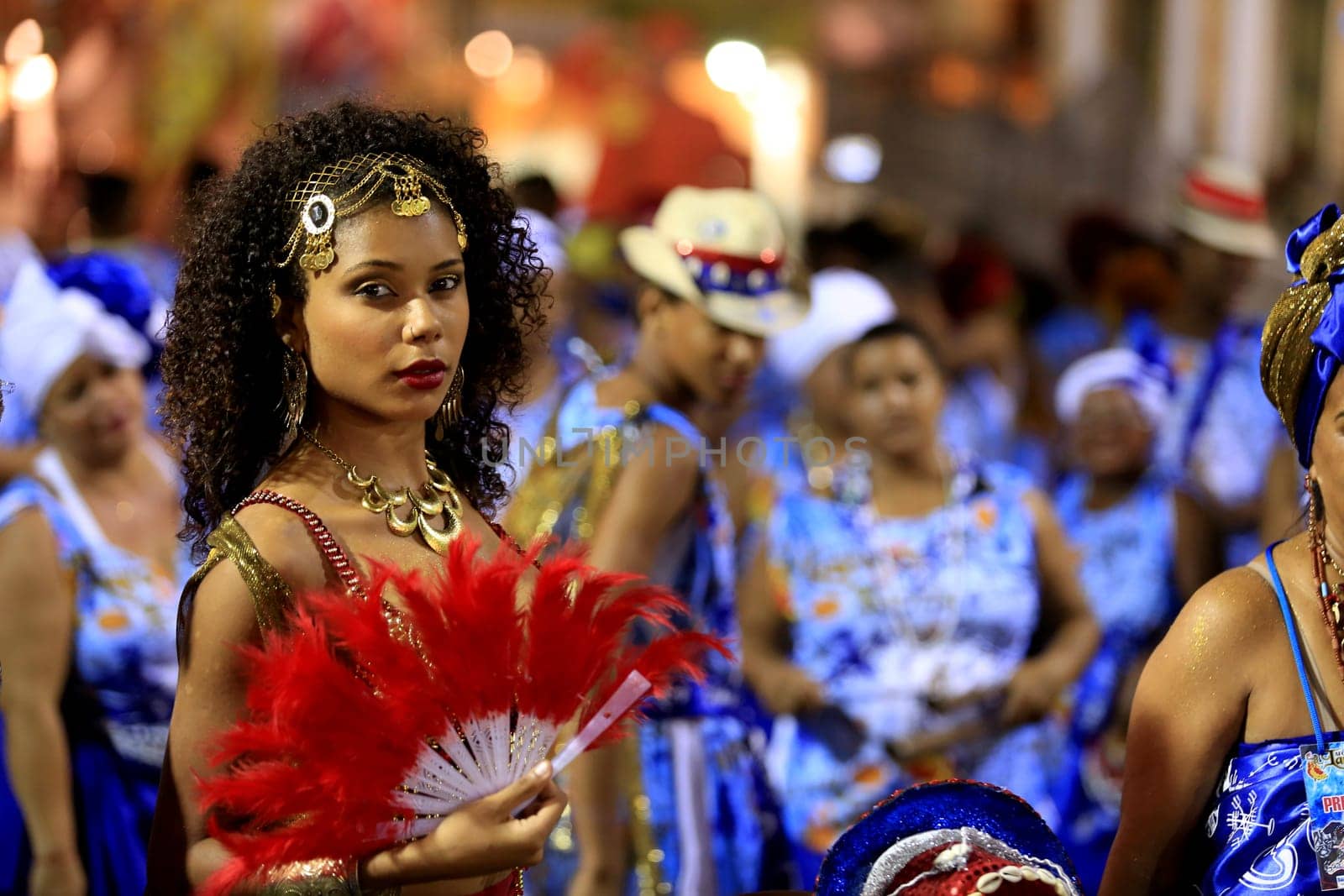 salvador, bahia - brazil - march 4, 2016: members of the carnival block Afoxe Laroye are seen wearing Orix costumes from Candomble at Circuito Batatinha (Pelourinho) during the carnival in the city of Salvador.