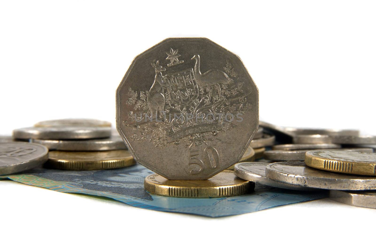 australian cash and coins over white