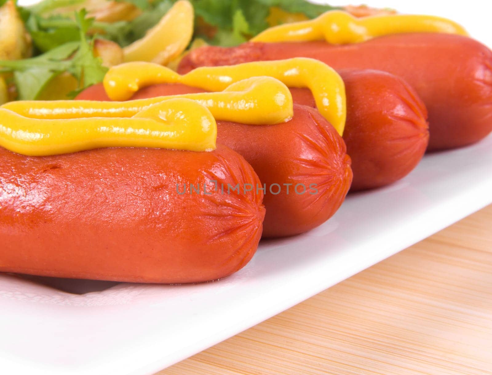 delicious sausages closeup on the plate