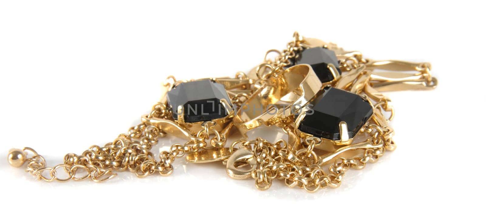 various jewelry closeup over white