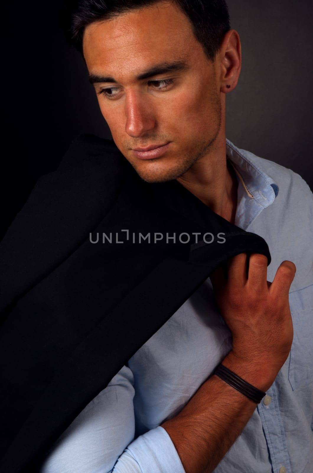 portrait of the elegant man on dark