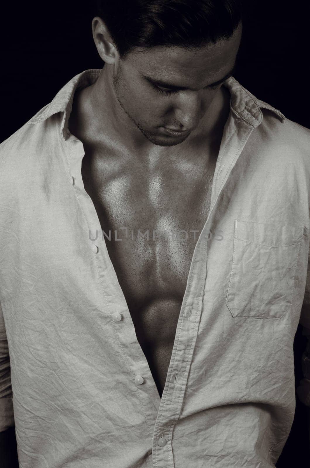portrait of the elegant man on dark
