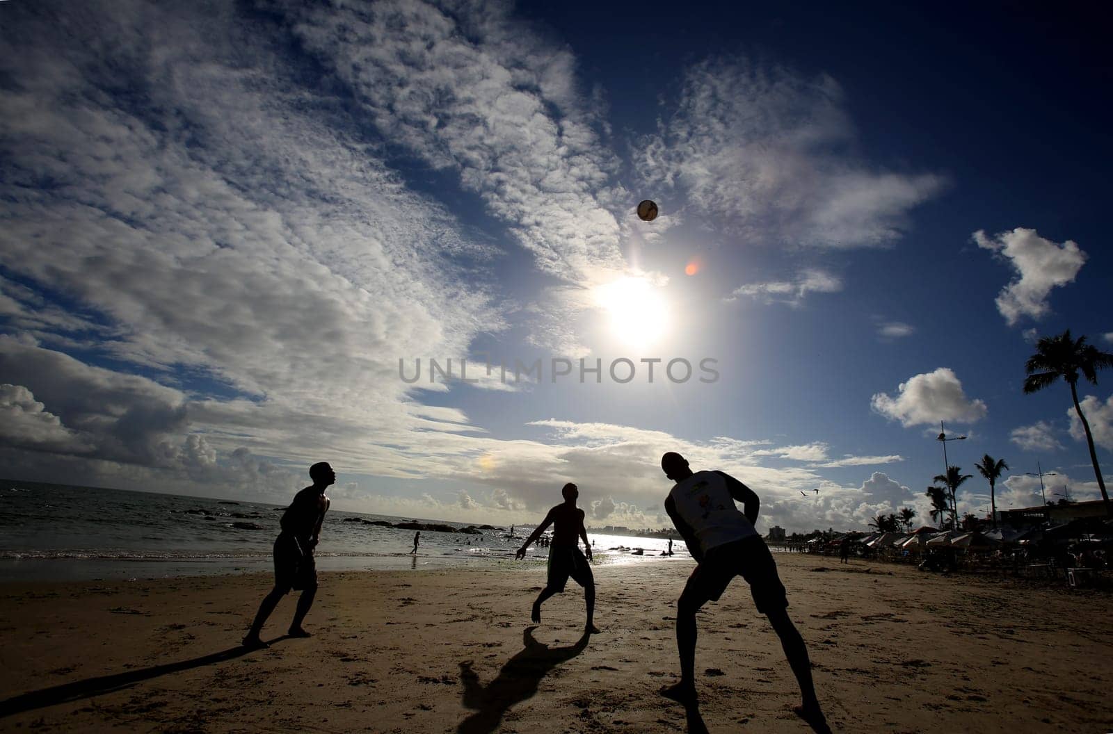 salvador, bahia / brazil - december 22, 2015: people are seen playing football on Itapua beach in the city of Salvador.....