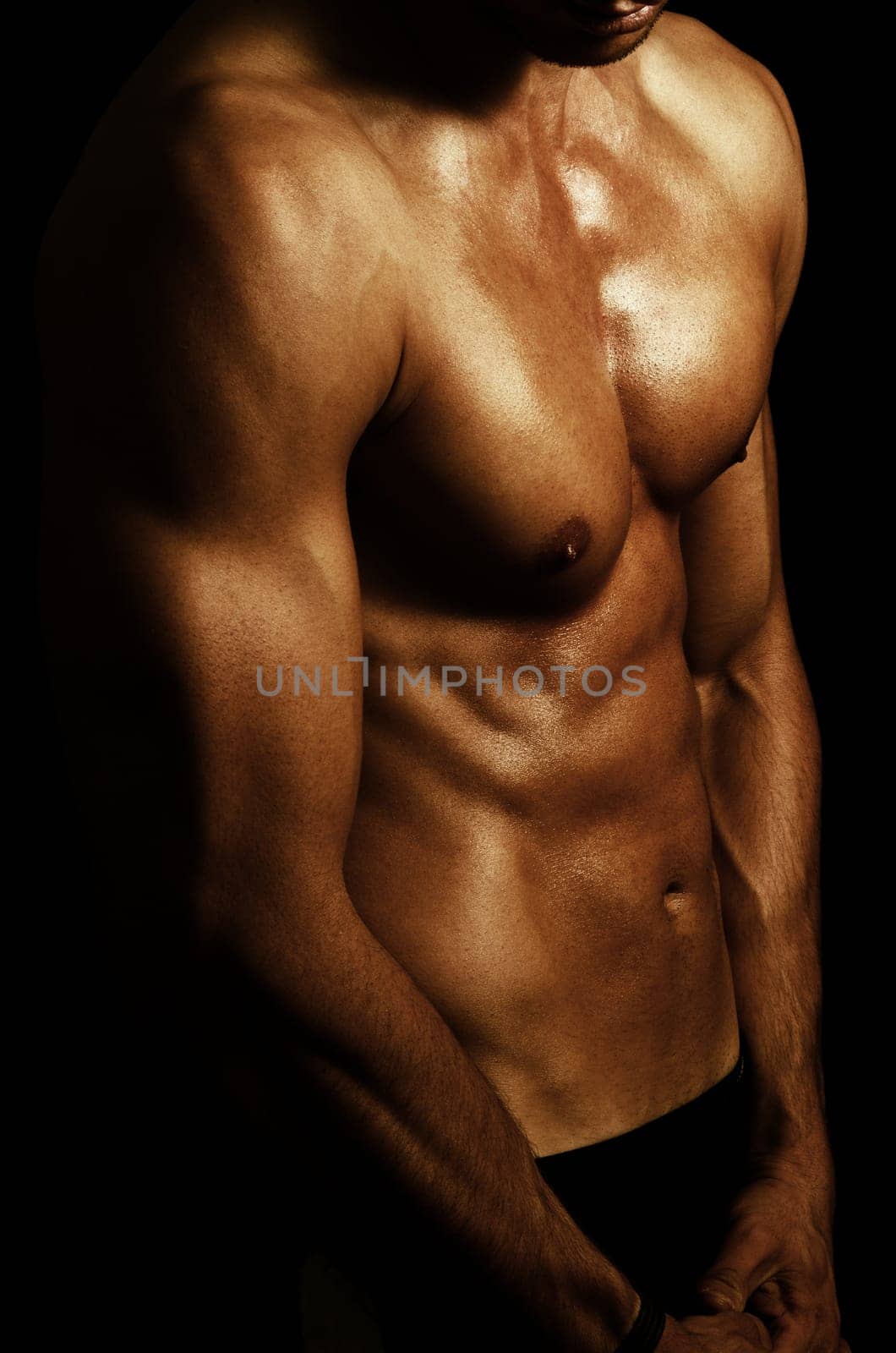 shape of sporty male body on dark