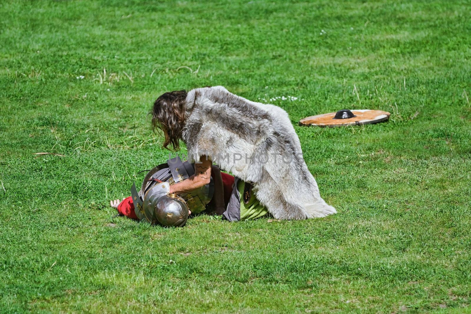 Alba Iulia, Romania - May 04, 2019: Fight between Roman Legionary and Dacian Warrior During the Festival Roman Apulum "Revolta""."