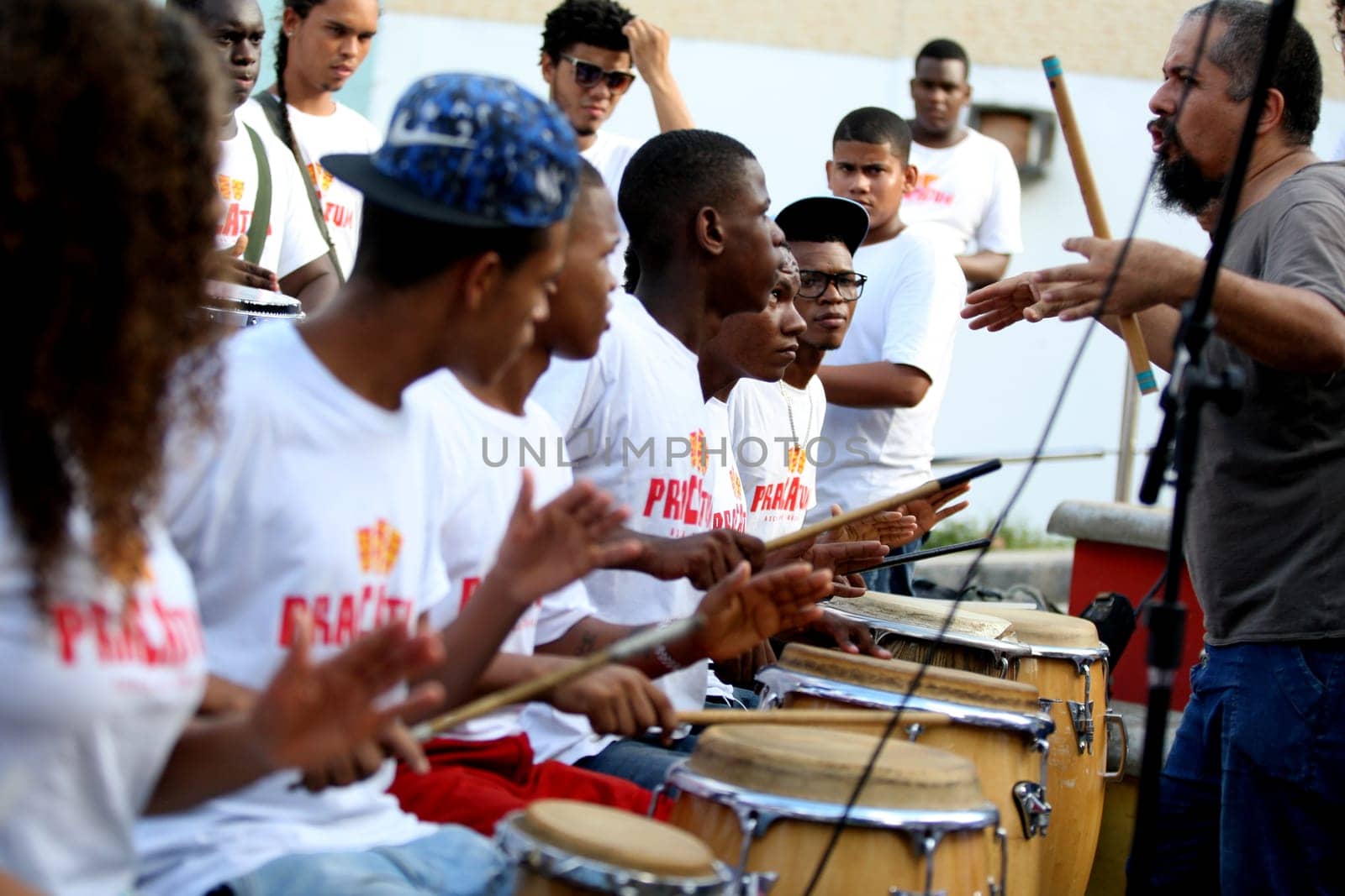 salvador, bahia / brazil - may 12, 2016: students from the music school Pracatum are seen during a presentation in the neighborhood of Candeal in the city of Salvador....
