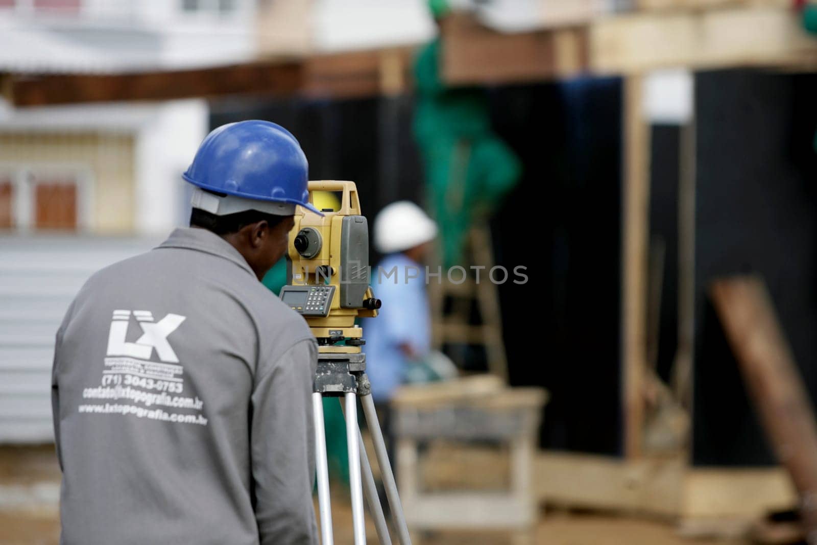 salvador, bahia / brazil - march 3, 2016: surveyor is seen making measurements under construction at the Municipal Hospital in the city of Salvador.
