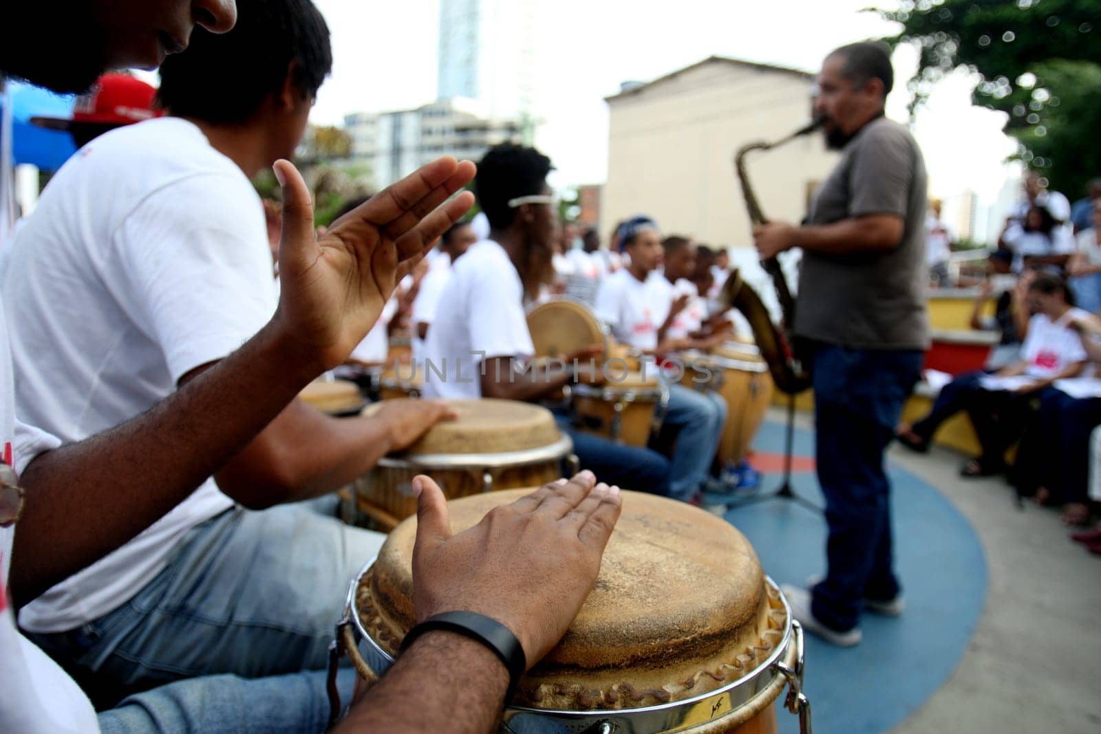 salvador, bahia / brazil - may 12, 2016: students from the music school Pracatum are seen during a presentation in the neighborhood of Candeal in the city of Salvador....