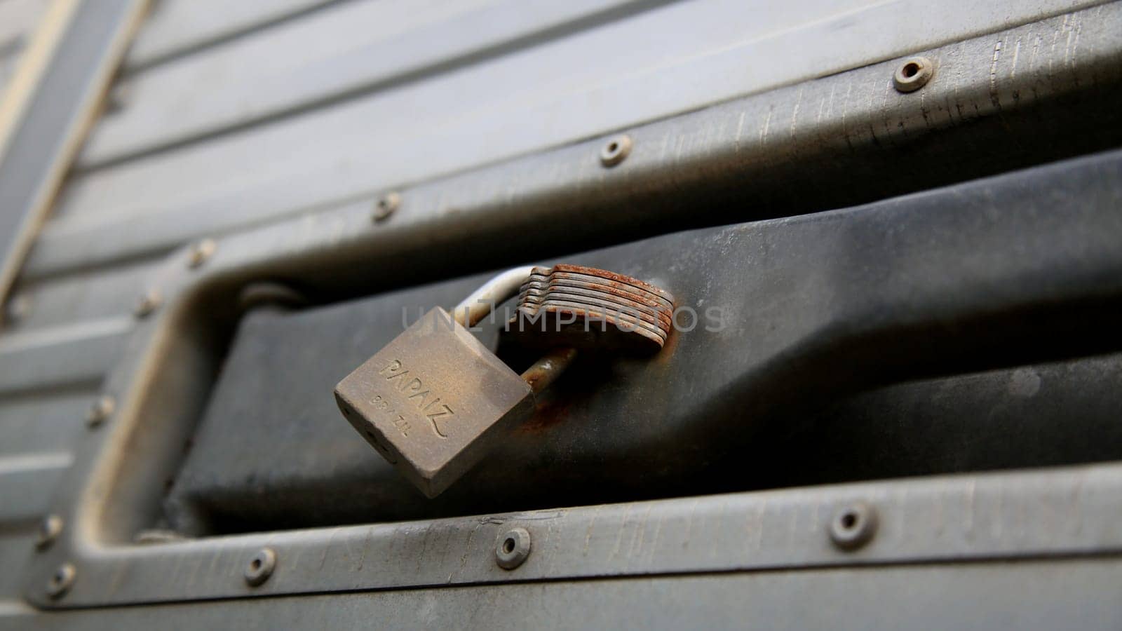 salvador, bahia / brazil - june 29, 2020: padlock is seen at the door in a residential condominium in the city of Salavdor.