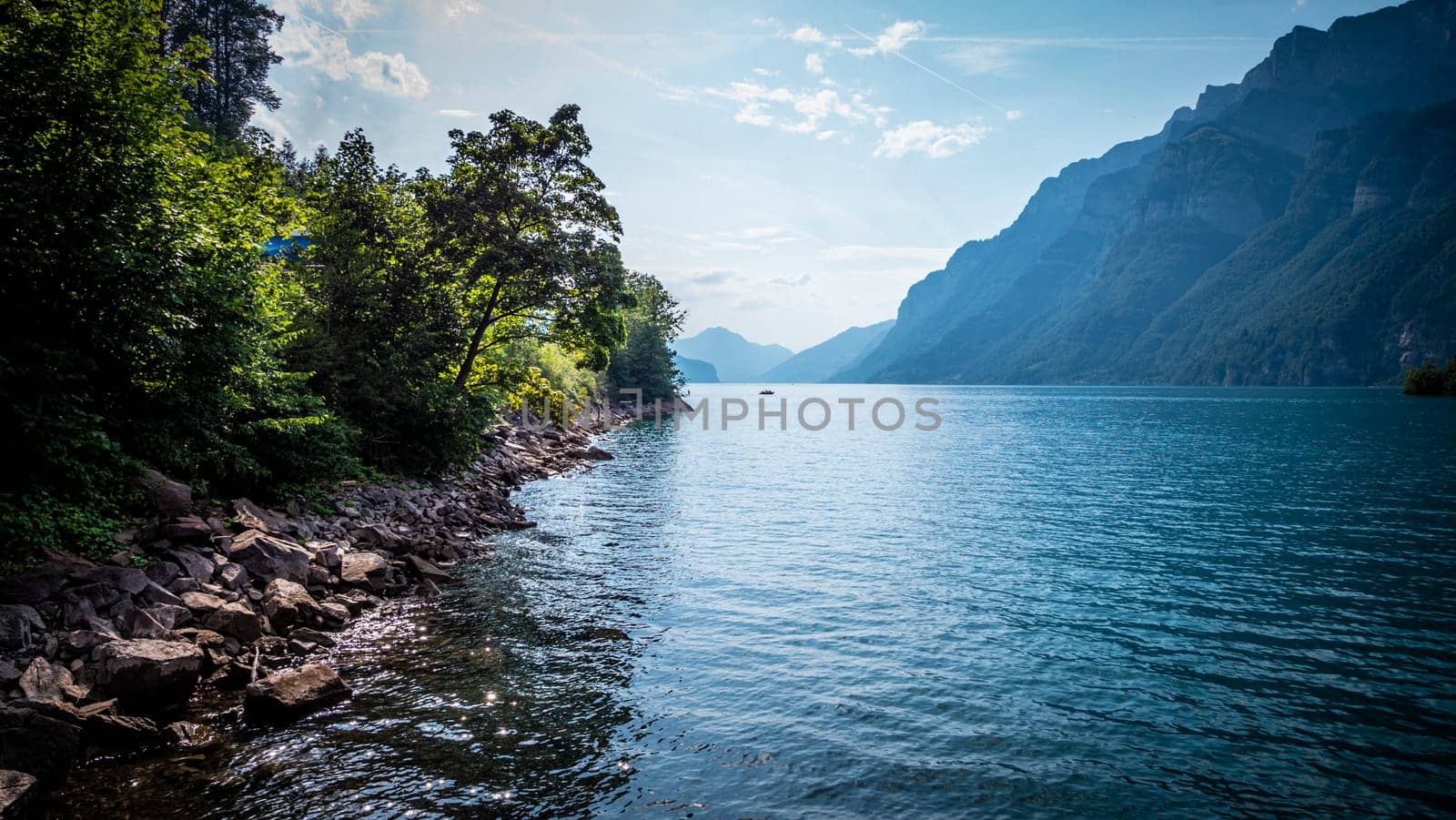 Beautiful blue water of Lake Walensee in Switzerland - travel photography