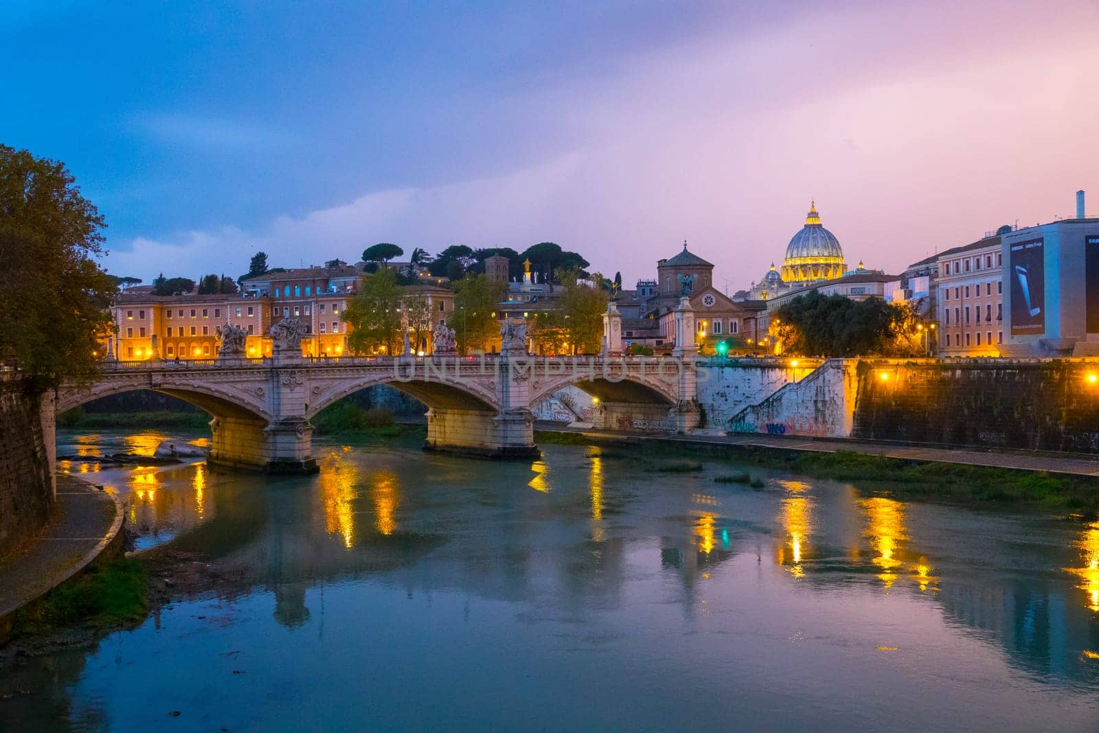 Amazing evening view over River Tiber and its bridges in Rome