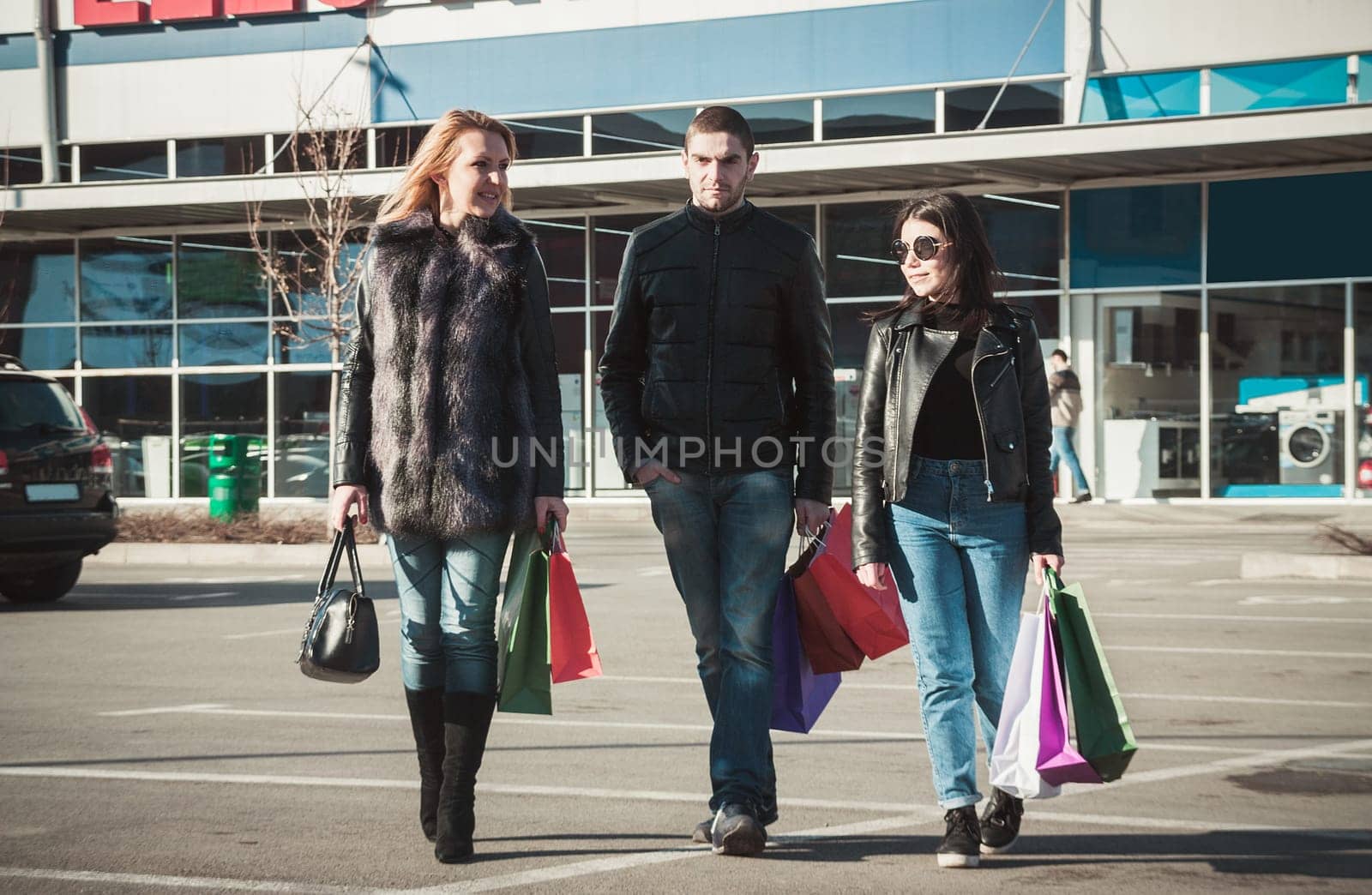 Happy friends making shopping