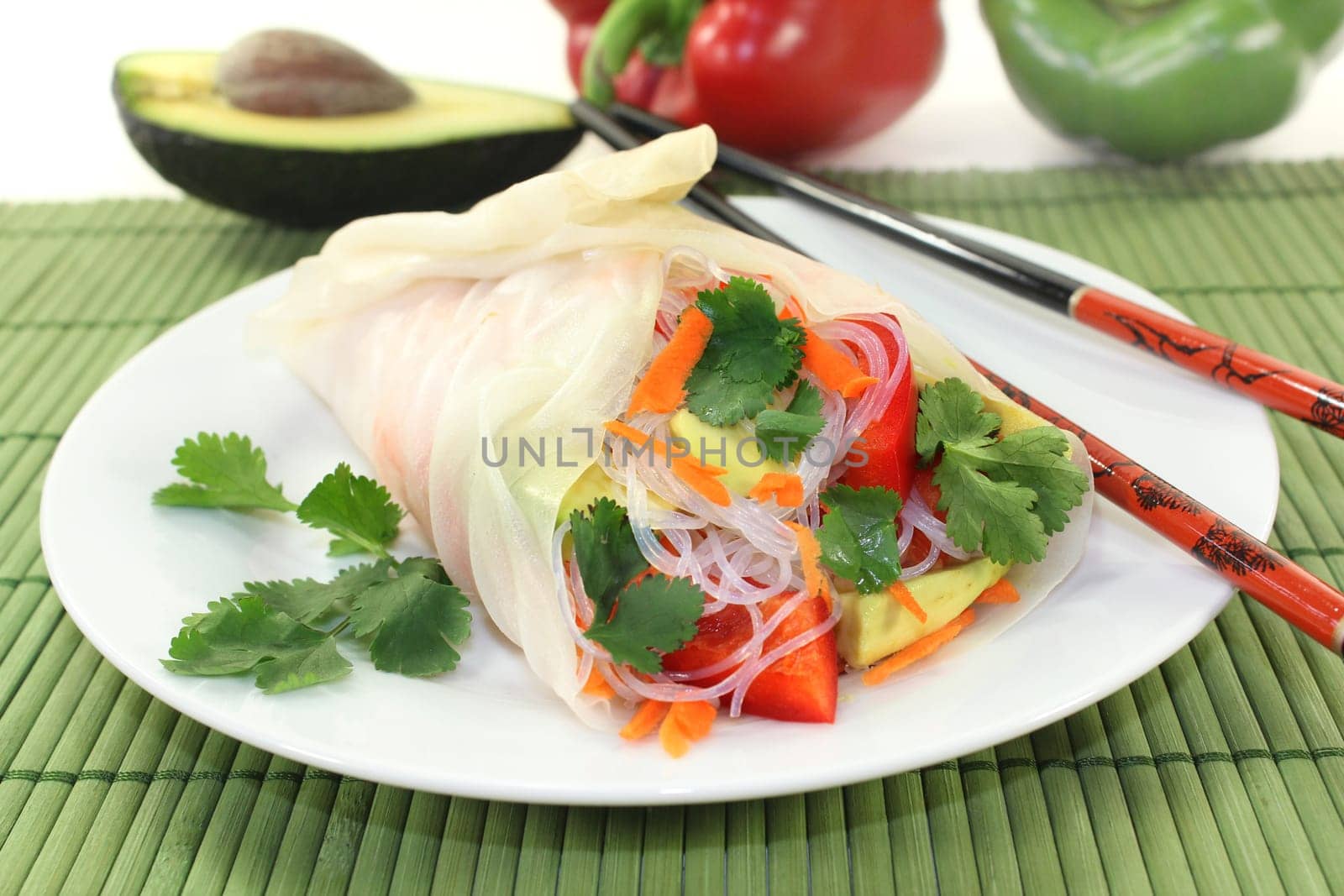 Rice paper stuffed with glass noodles,carrots,peppers and coriander