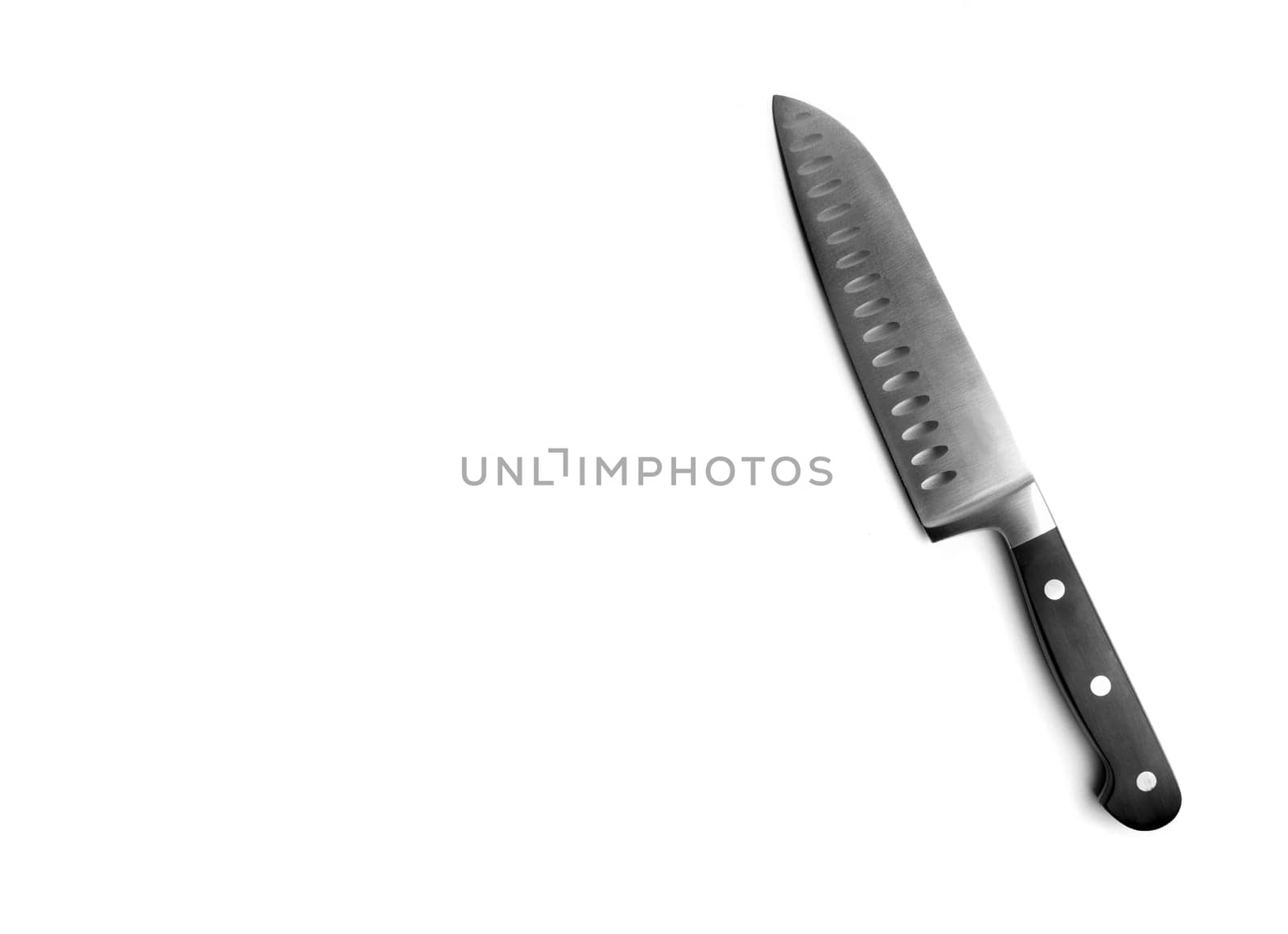 Black kitchen knife on the white