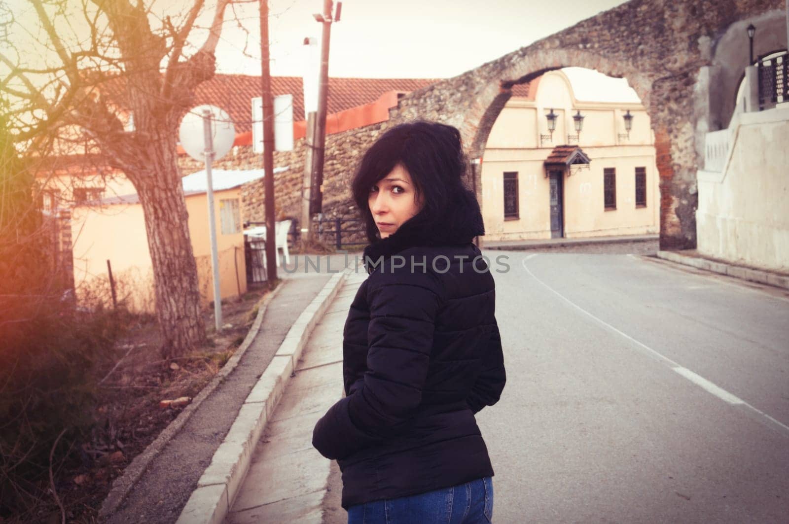 Brunette woman traveling in town