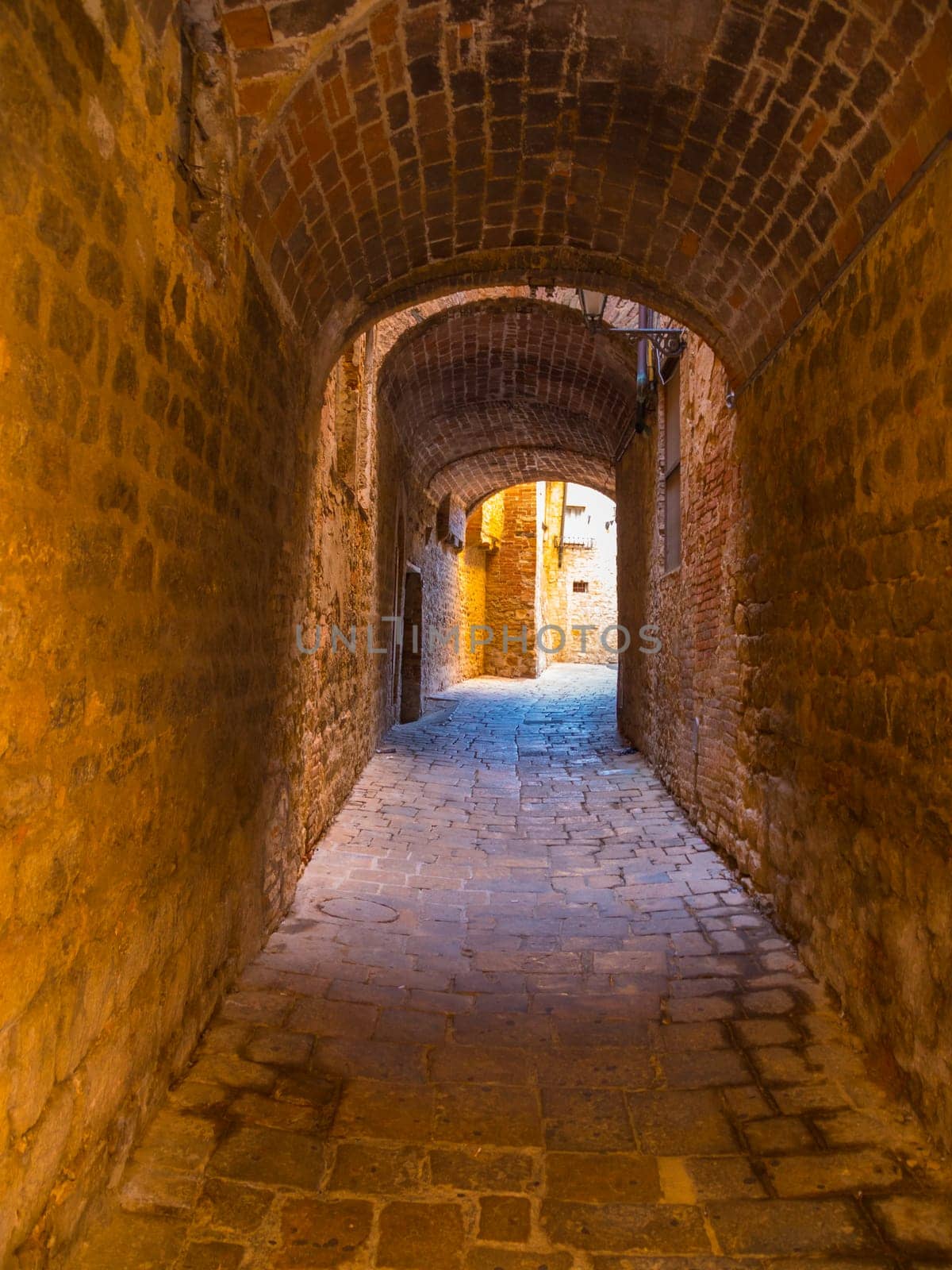 Narrow lanes in the beautiful city center of Volterra in Tuscany