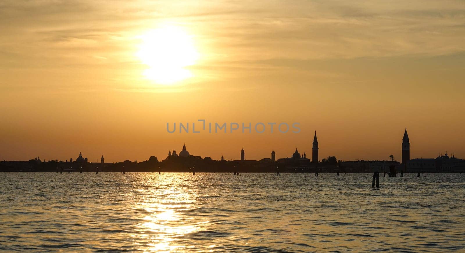 Wonderful sunset over the city of Venice - Skyline in the backlight
