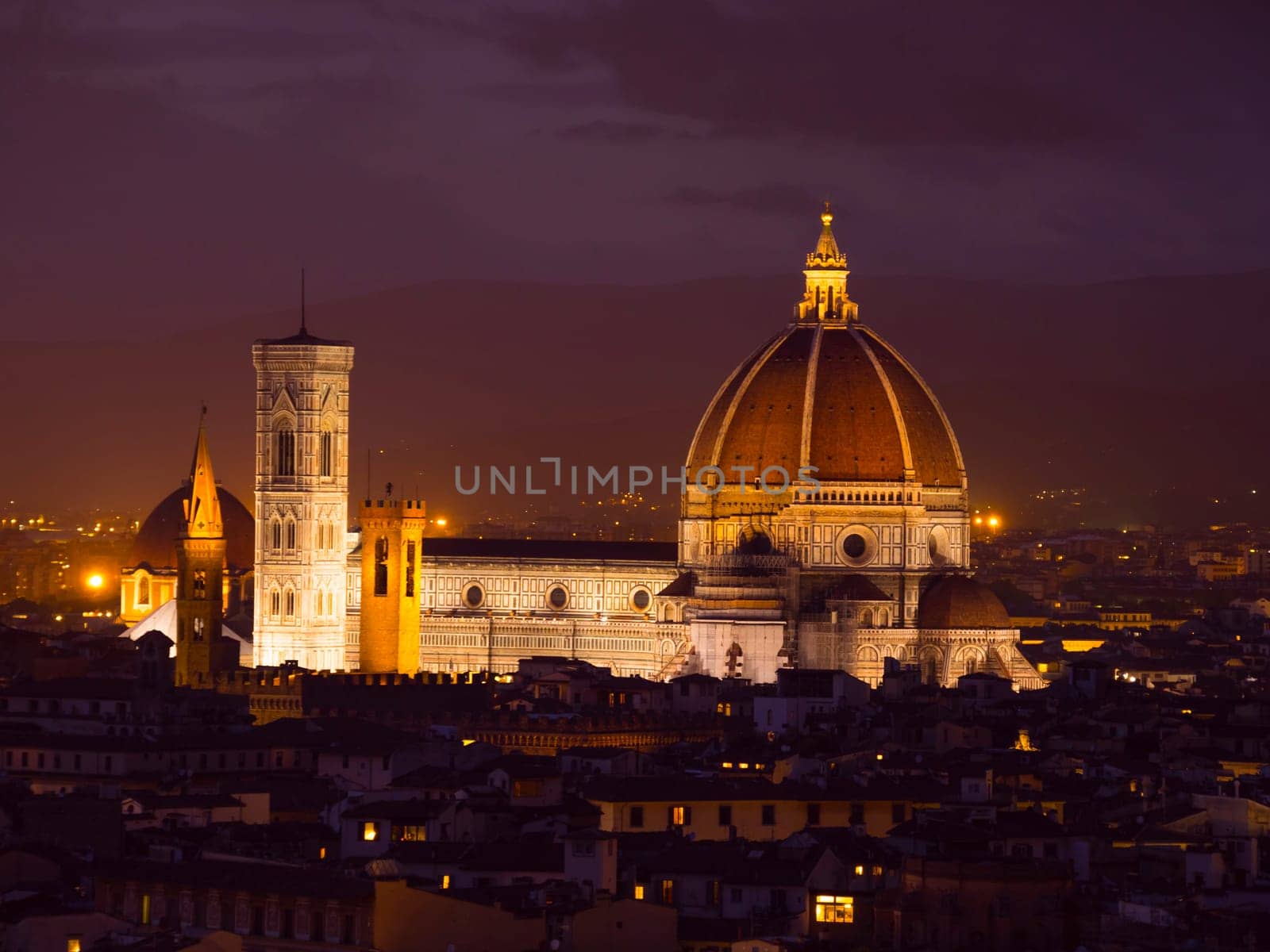 The Florence Cathedral on Duomo Square at night - amazing aerial view - Tuscany, Italy