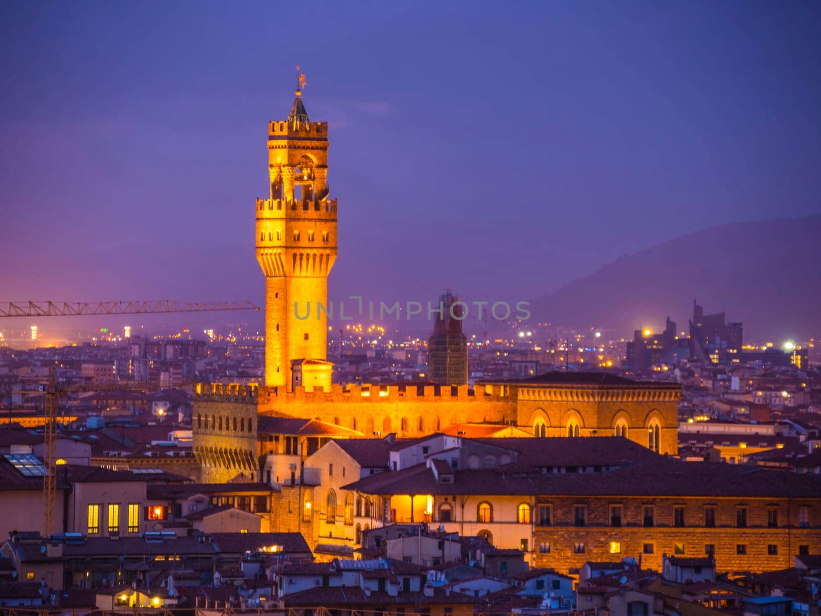 Palazzo Vecchio in Florence in the evening - aerial view - Tuscany, Italy