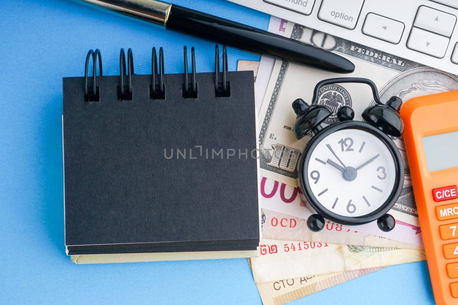 Flat lay of business with office stationary concept on blue background. Business and Copy Space concept
