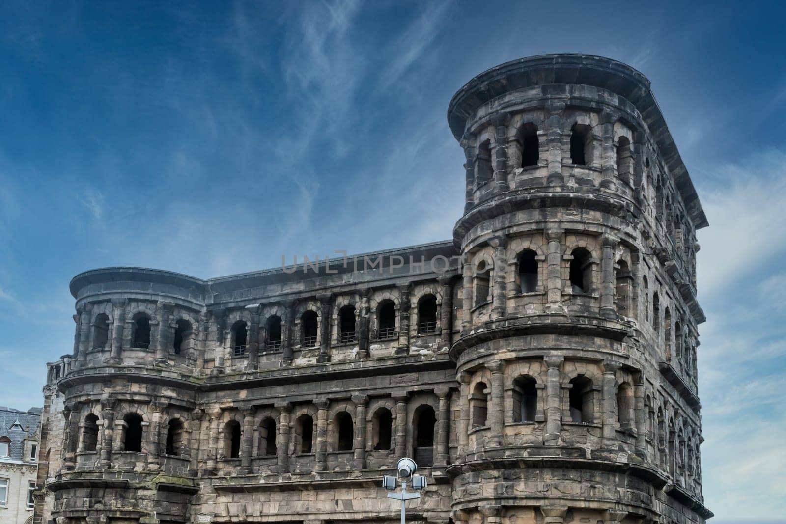 Famous Porta Nigra Monument in Trier Germany with blue sky in Summer