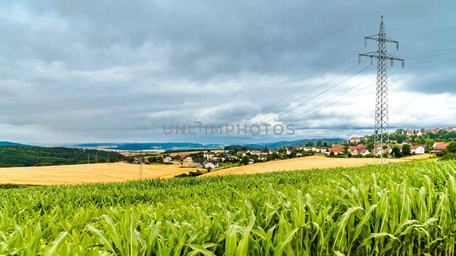 Electrical high voltage pylon in landscape in North Hesse Waldecker Land, Germany