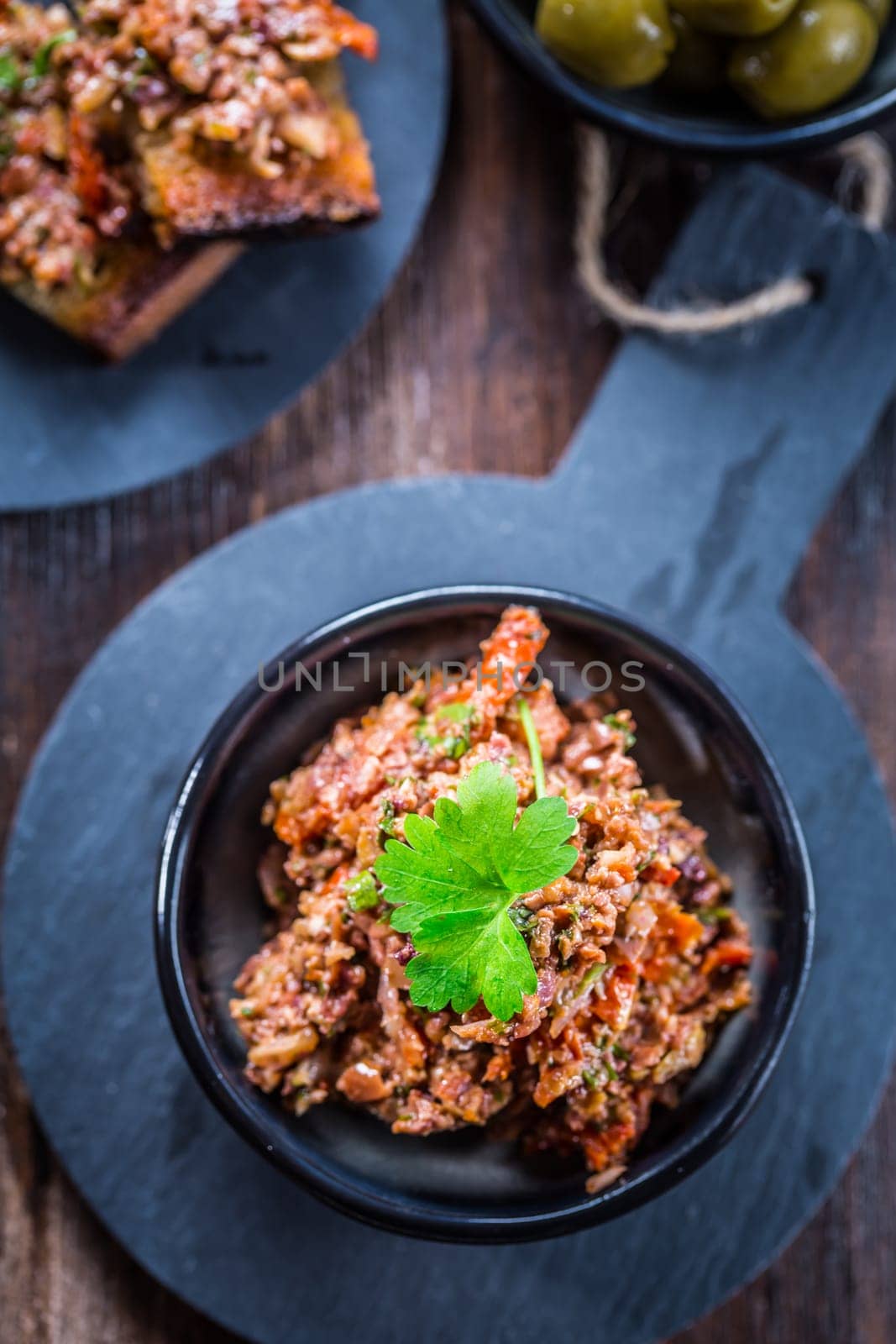 Tapenade - delicious olive paste from France. Top view.