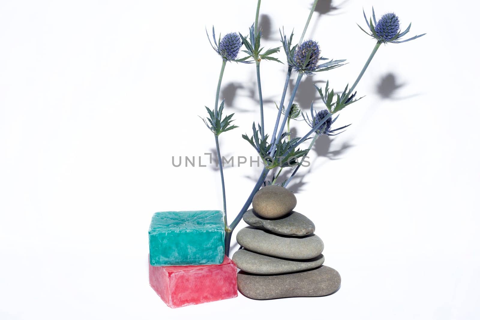 soaps off various shades with grey sone pebbles and lavender