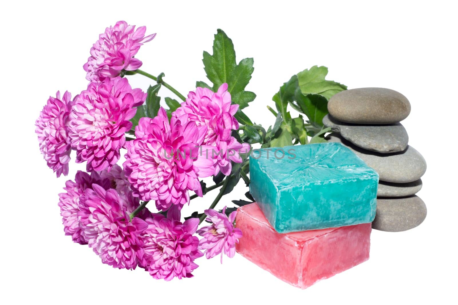 soaps off various shades with grey sone pebbles and flowers