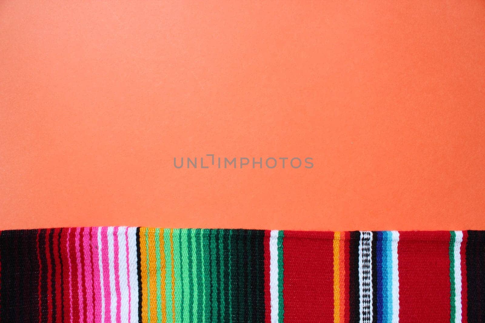 poncho Mexican cinco de mayo rug serape fiesta traditional Mexico background with stripes copy space maya blanket minimal simple -  stock, photo, photograph, image, picture