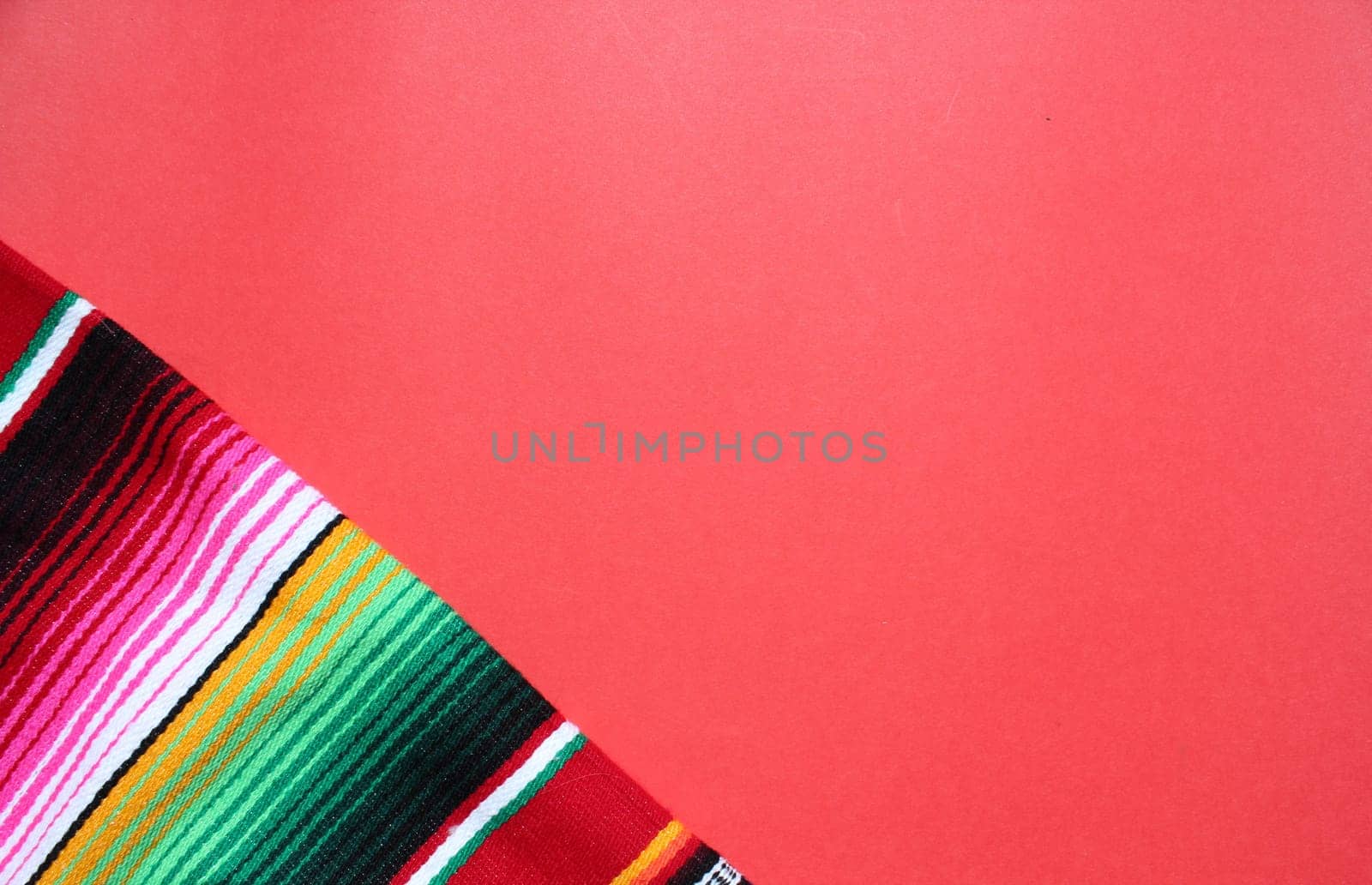 poncho Mexican cinco de mayo rug serape fiesta traditional Mexico background with stripes copy space maya blanket minimal simple -  stock, photo, photograph, image, picture