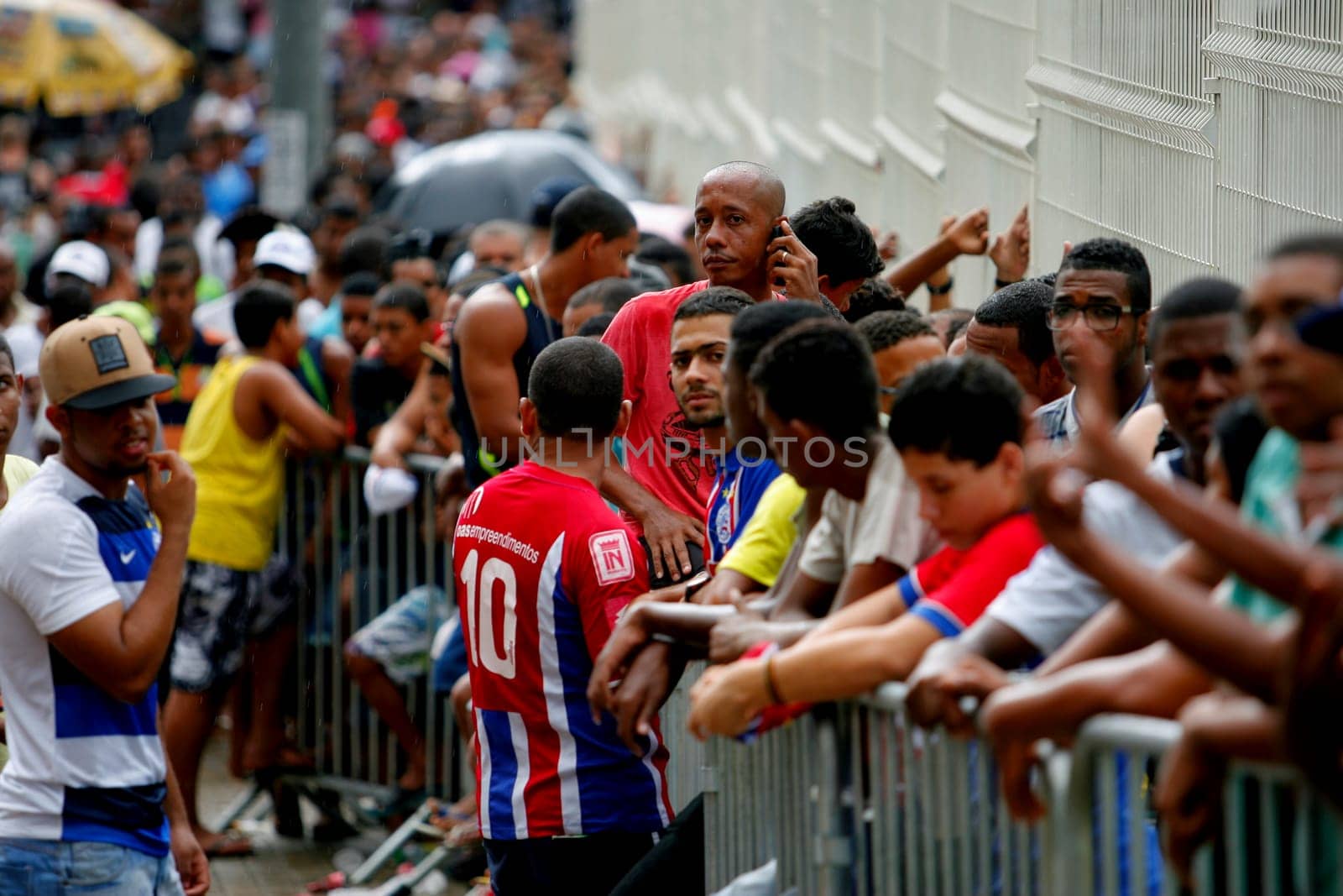 salvador, bahia / brazil - april 20, 2015: Esporte Clube Bahia fans face the queue to buy tickets at the Fonte Nova Arena in the city of Salvador, for the Bahia Football Championship match.