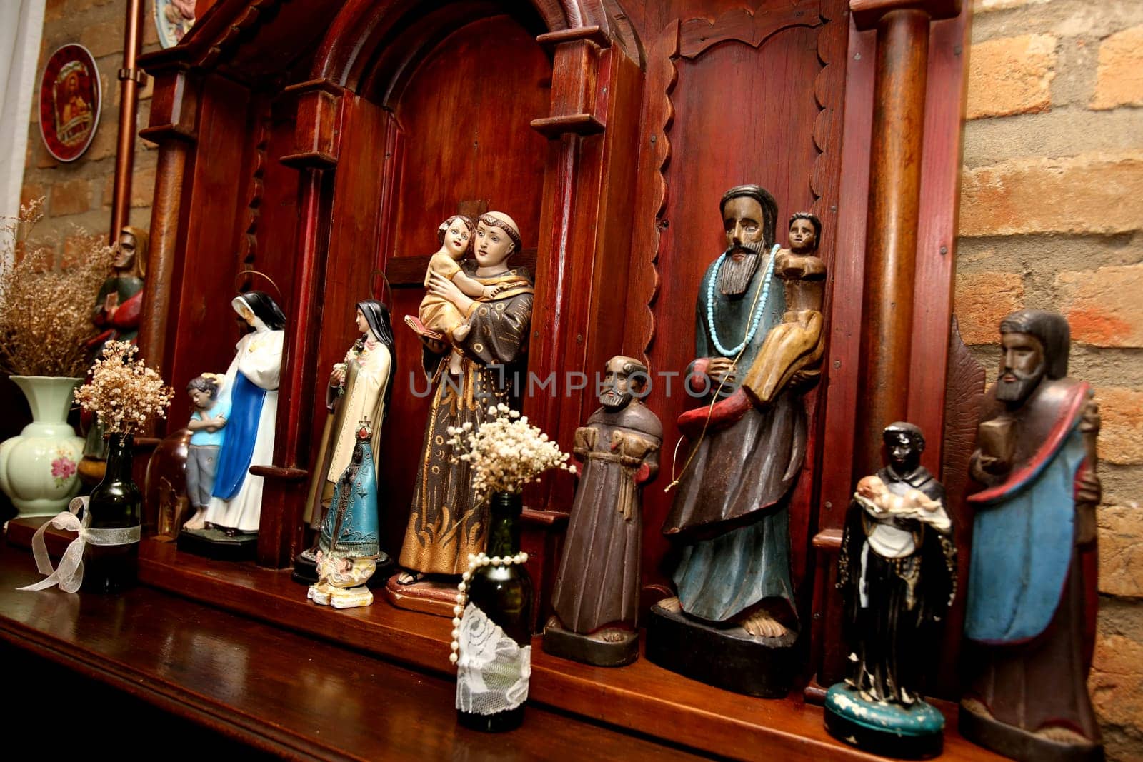 salvador, bahia / brazil - july 3, 2018: View of altar of religious works in residence in the city of Salvador..