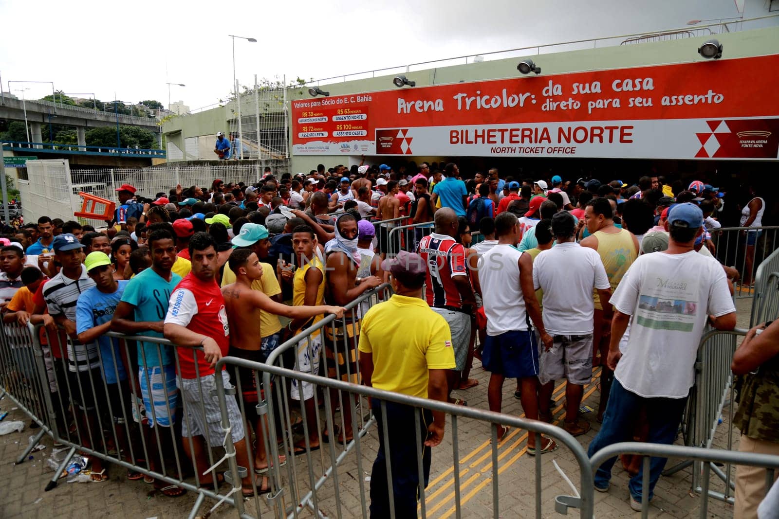 salvador, bahia / brazil - april 20, 2015: Esporte Clube Bahia fans face the queue to buy tickets at the Fonte Nova Arena in the city of Salvador, for the Bahia Football Championship match.