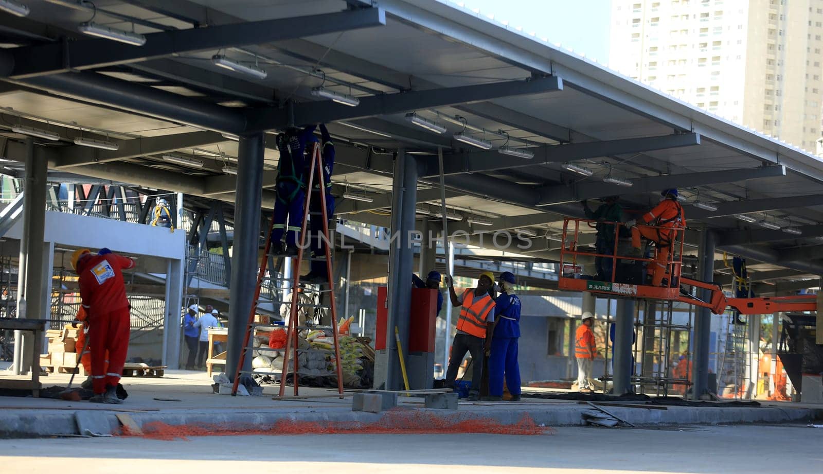 salvador, bahia / brazil - september 15, 2015: workers are seen working on the construction of the bus station next to the metro station in Ratula do Abacaxi in the city of Salvador...