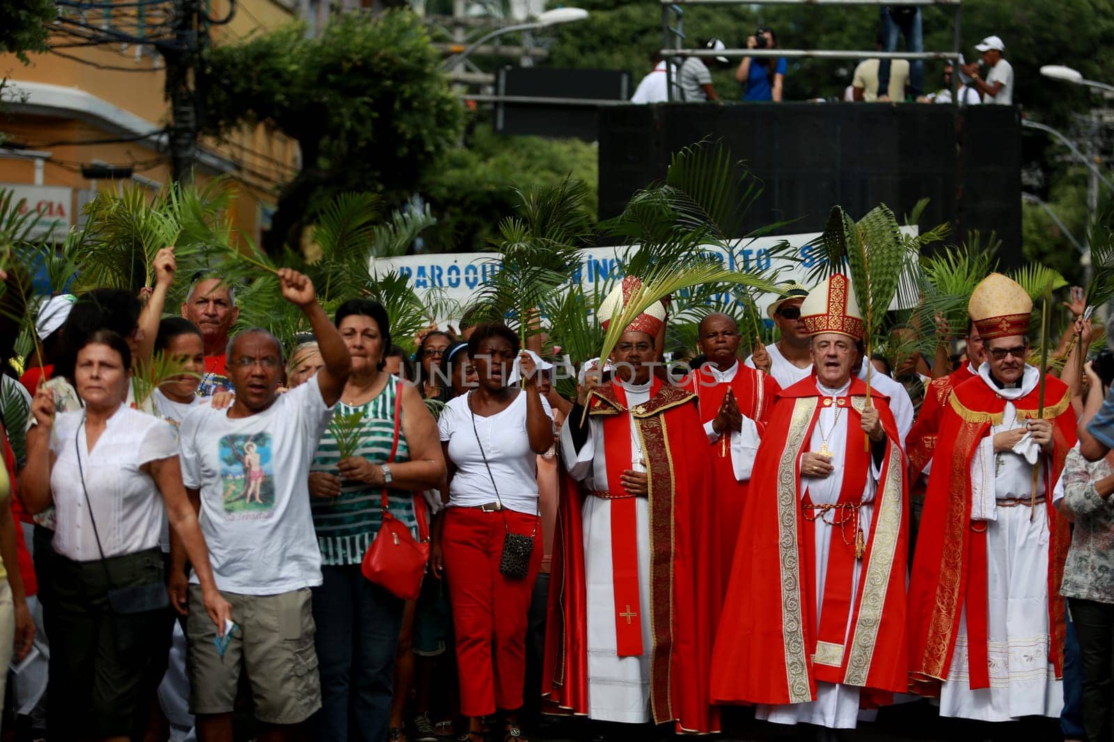 salvador, bahia / brazil - march 29, 2015: Catholics are seen carrying palm branches during Ramos procession in the city of Salvador. The Christian feast, celebrated on the Sunday before Easter, symbolizes the entry of Jesus Christ into Jerusalem..