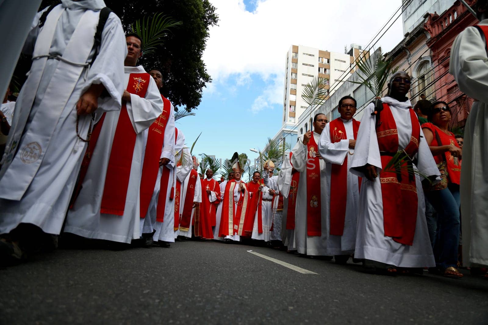 salvador, bahia / brazil - march 29, 2015: Catholics are seen carrying palm branches during Ramos procession in the city of Salvador. The Christian feast, celebrated on the Sunday before Easter, symbolizes the entry of Jesus Christ into Jerusalem..
