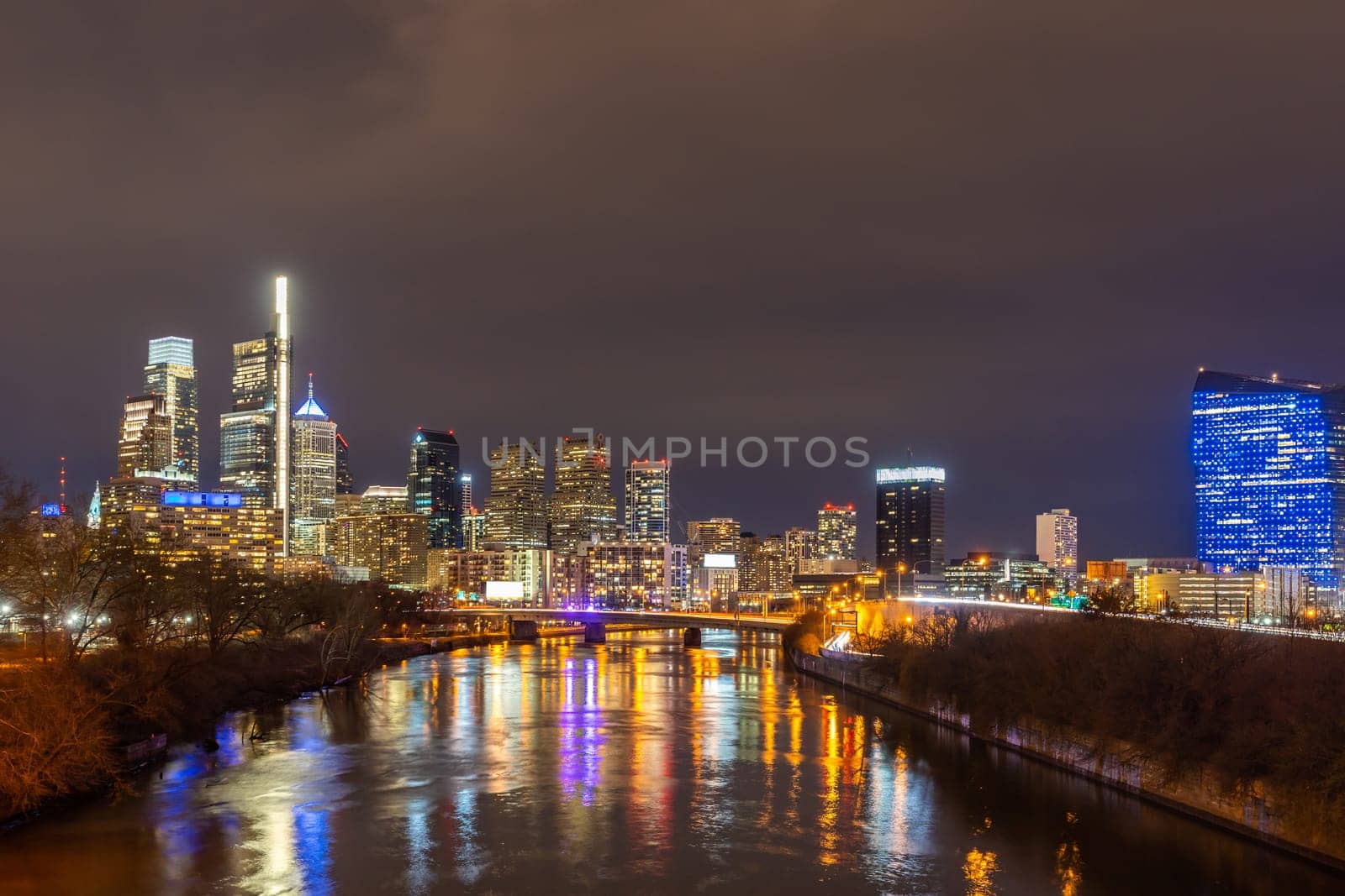 Night Cityscape of Philadelphia skyscraper Skylines building sunset along river in Philly city downtown of Philadelphia in PA USA. Cityscape Urban lifstyle concept.