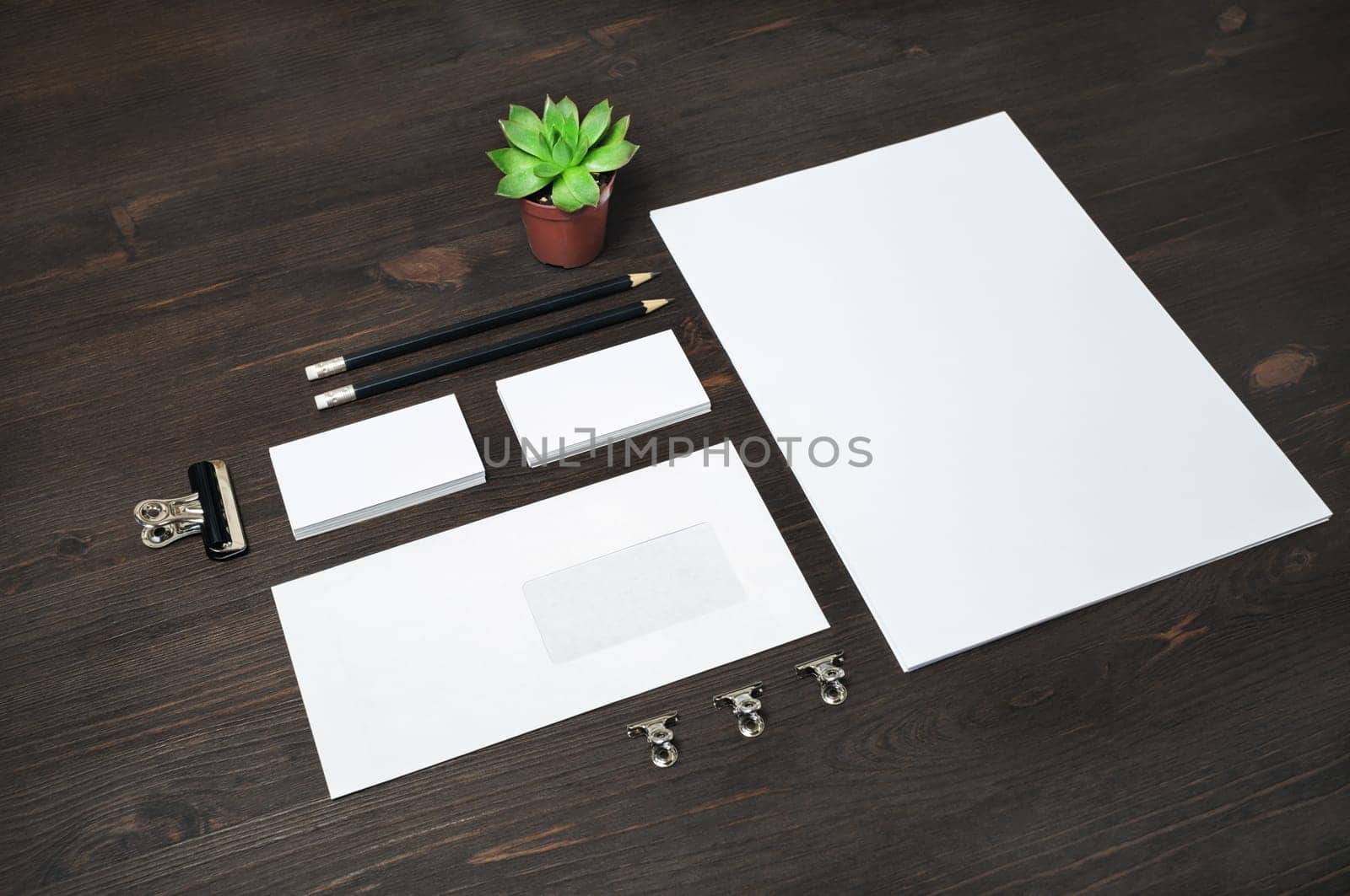 Blank corporate stationery set on wood table background. Template for branding design. Branding mock up.