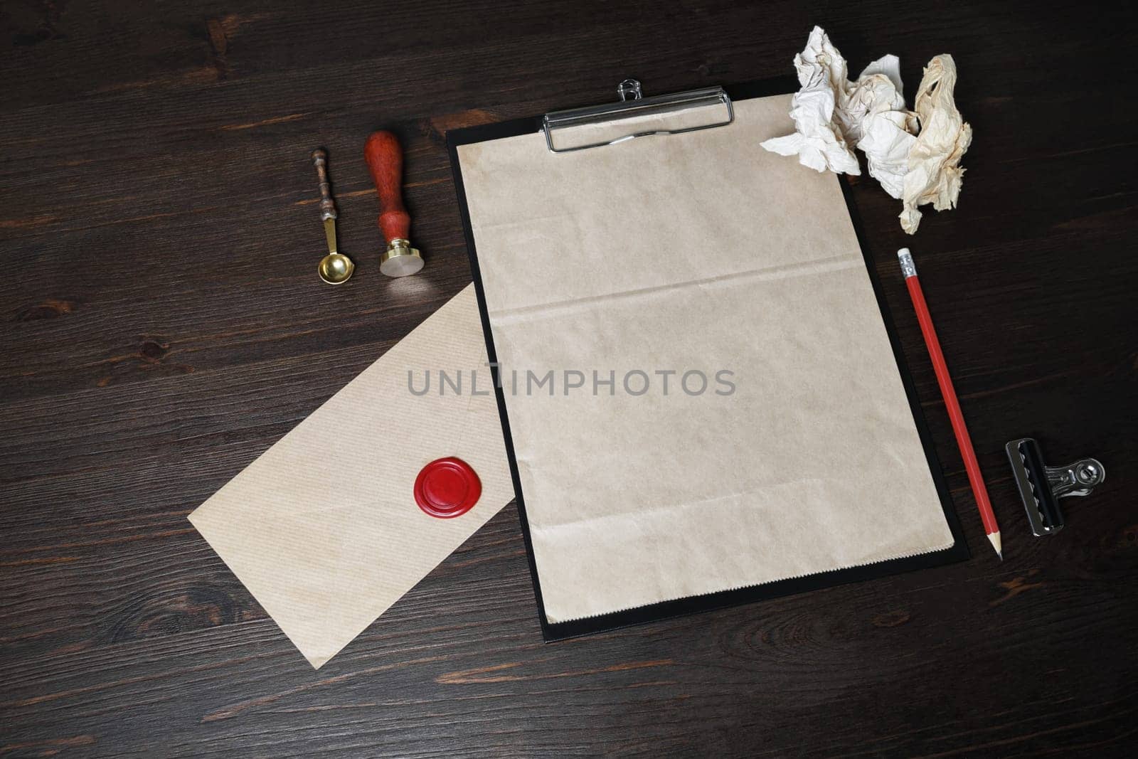 Branding mock up. Photo of blank vintage stationery on wood table background.