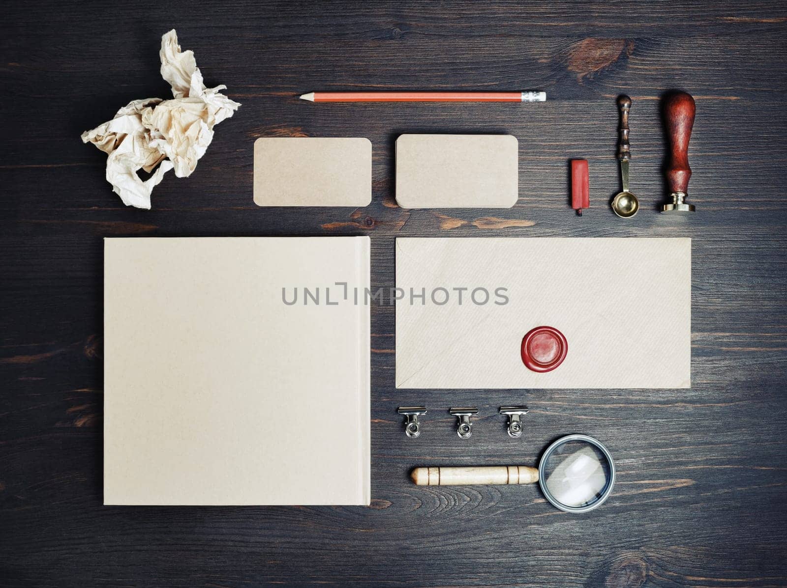 Blank retro stationery template on wooden background. Mock-up for branding identity. For design presentations and portfolios. Flat lay.