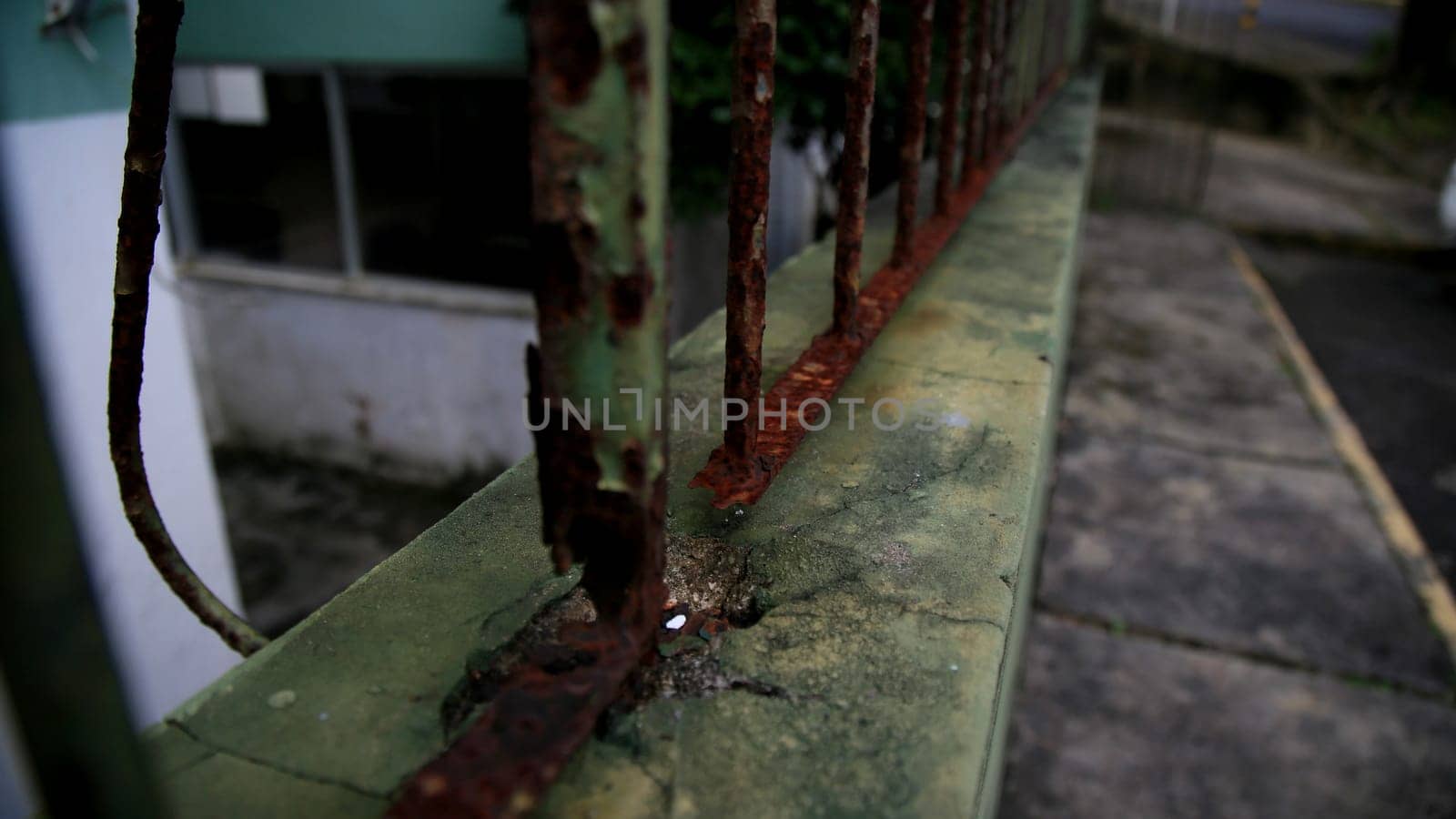salvador, bahia / brazil - july 4, 2020: rusty grid is seen on the street in the Cabula neighborhood in the city of Salvador.......