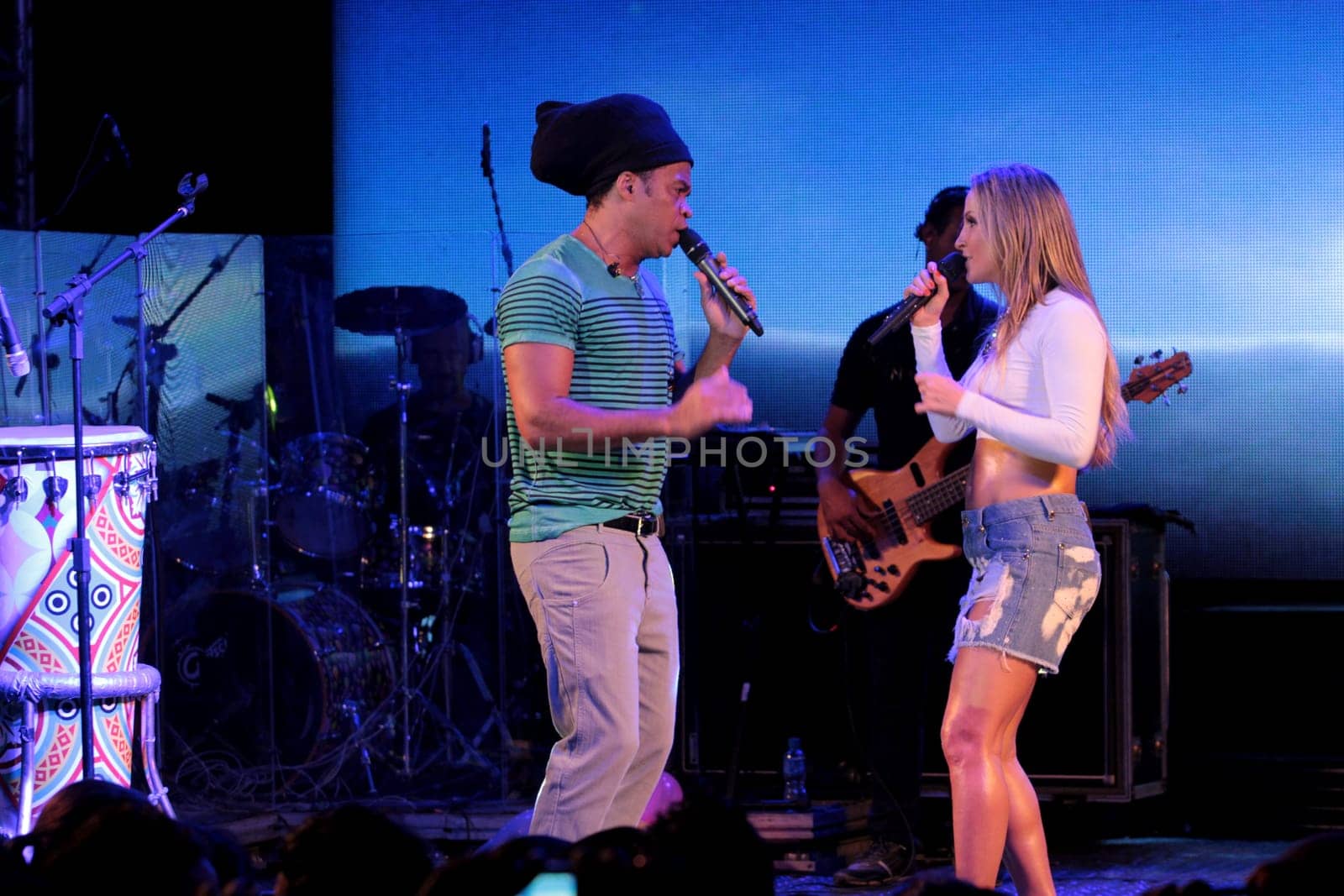 salvador, bahia / brazil - december 12, 2012: Claudia Leitte, singer is seen alongside singer Carlinhos Brown during a performance in the city of Salvador.