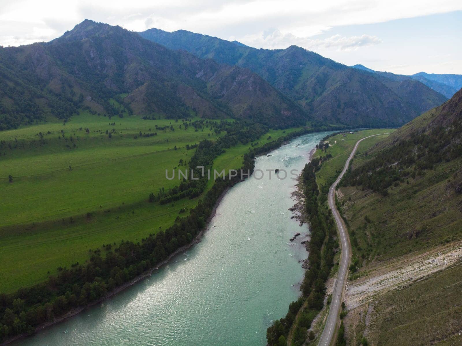 Aerial view of Katun river, in Altai mountains, in beauty summer evening, drone shot