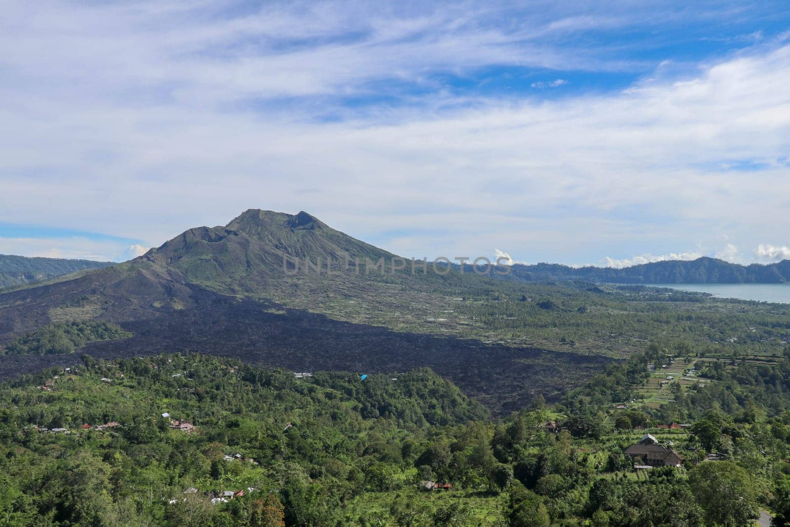 Panorama of Mount Batur or Gunung Batur, an active volcano located at the center of caldera the surrounding area on the island of Bali, Indonesia. Best background for your project.