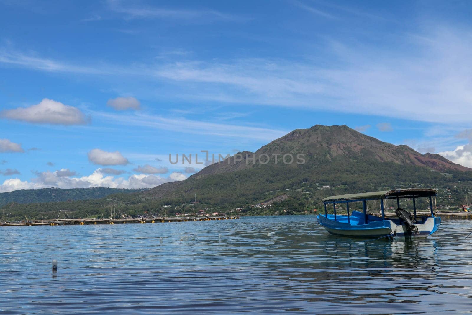 Panoramic indonesian landscape tropical island bali. Popular tourist attractions of Bali tropical island, amazing top view on Batur Indonesia. Batur lake and volcano are in the central mountains.